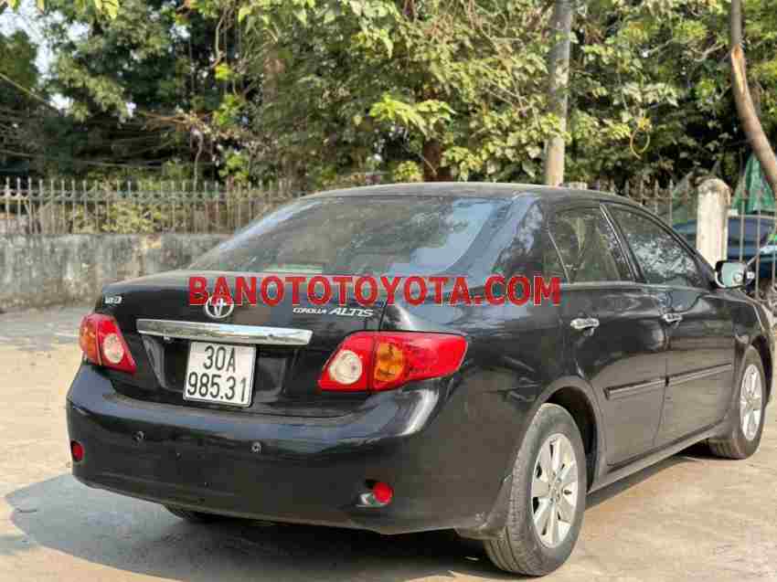 Cần bán gấp Toyota Corolla altis 1.8G MT đời 2009, màu Đen