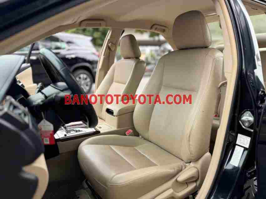 Cần bán gấp Toyota Camry 2.0E đời 2014, màu Đen