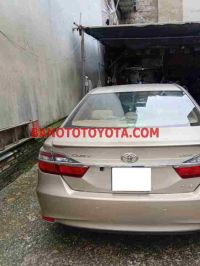Cần bán gấp Toyota Camry 2.0E đời 2015, màu Vàng
