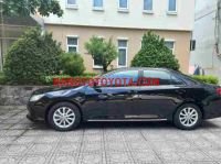 Cần bán gấp Toyota Camry 2.0E đời 2014, màu Đen