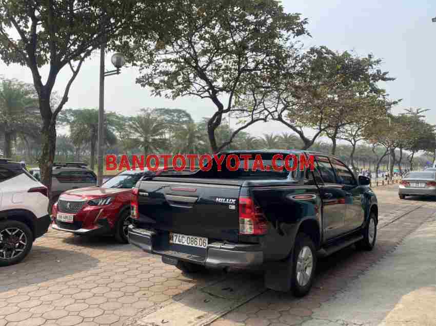 Cần bán gấp xe Toyota Hilux 2.4E 4x2 AT 2019 màu Đen