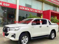 Cần bán gấp Toyota Hilux 2.4E 4x2 AT đời 2020, màu Trắng