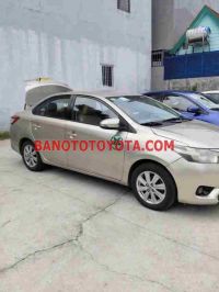 Cần bán gấp xe Toyota Vios 1.5E 2014 màu Cát