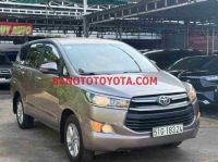 Cần bán gấp xe Toyota Innova 2.0E 2018 màu Nâu