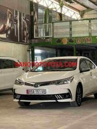 Cần bán gấp xe Toyota Corolla altis 1.8E AT 2018 màu Trắng